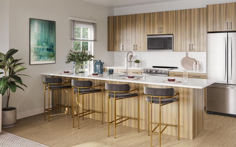 a kitchen with a bar stools